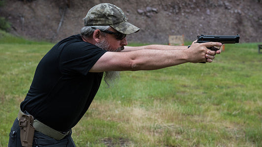 Stance shooting handgun